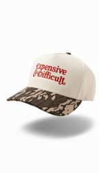 Beige and leopard camo snapback hat with 'Expensive & Difficult' text on a white background
