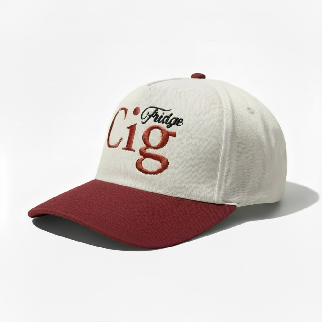 Beige snapback hat with "fridge cig" text and maroon brim on a white background