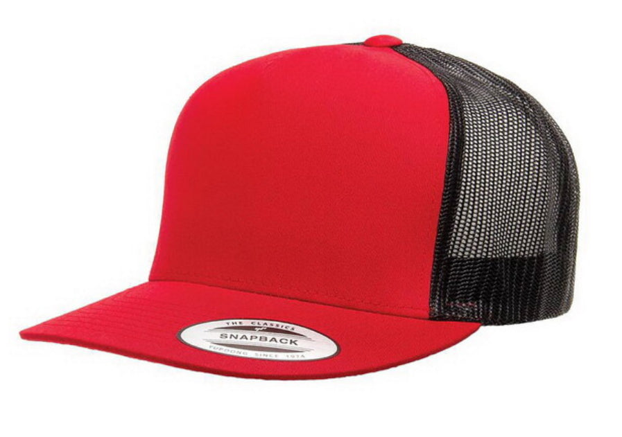 Red and black trucker hat with a white label on a white background